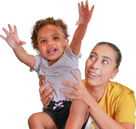 BCBA therapist with happy toddler